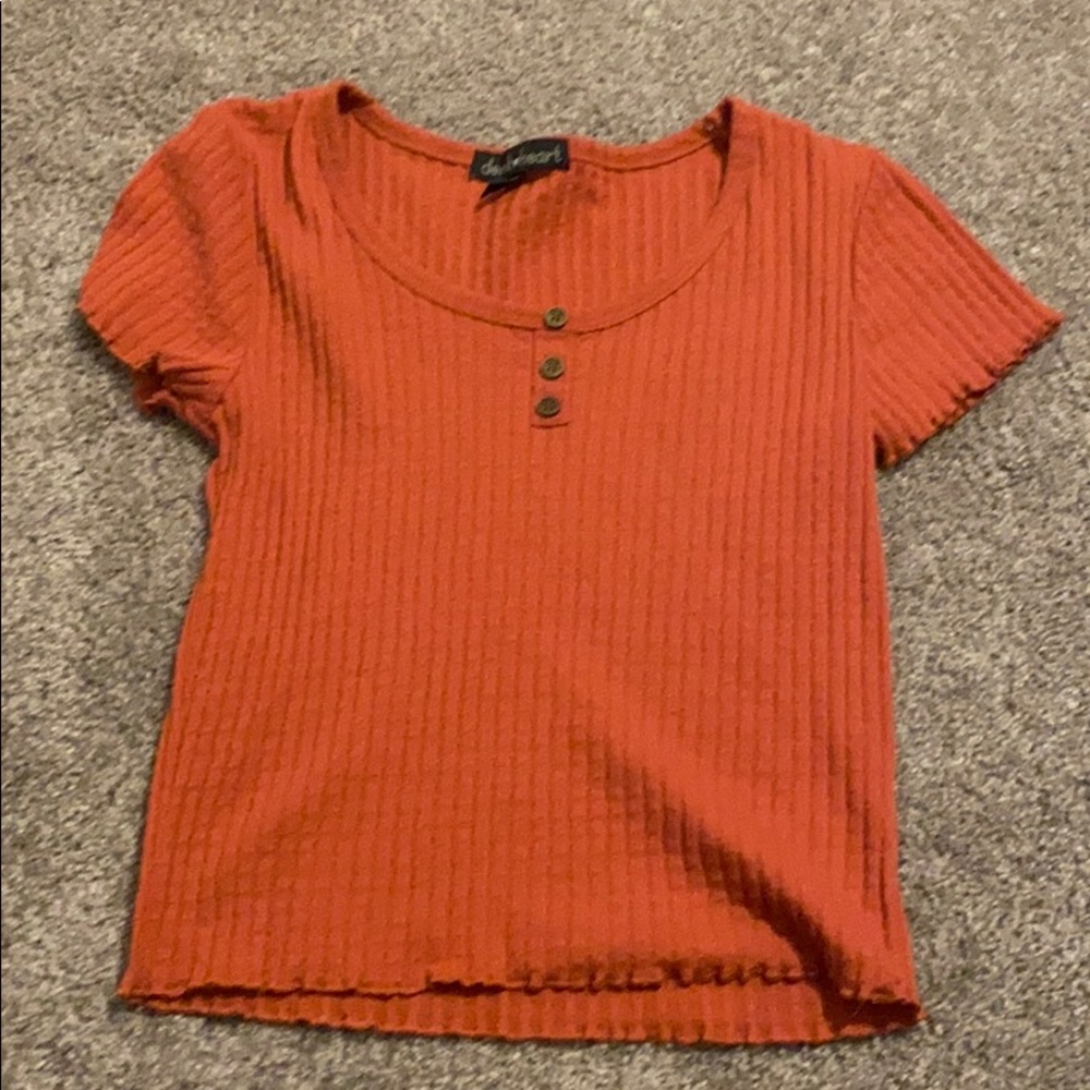 pinkish red shirt